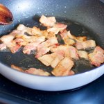 Cook the bacon to render out the fat.