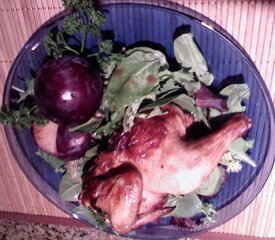 Cornish Hens and Plums on Baby Spinach