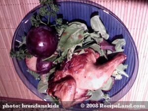 Cornish Hens and Plums on Baby Spinach