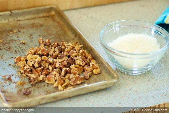 Prepare the walnuts and parmesan cheese