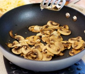 Grilled Cheese Sandwich with Sauteed Mushrooms and Arugula