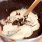 Beat in 1 cup sour cream until well blended.