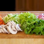 Chop the fresh vegetables.