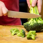 Peel and chop up the broccoli.
