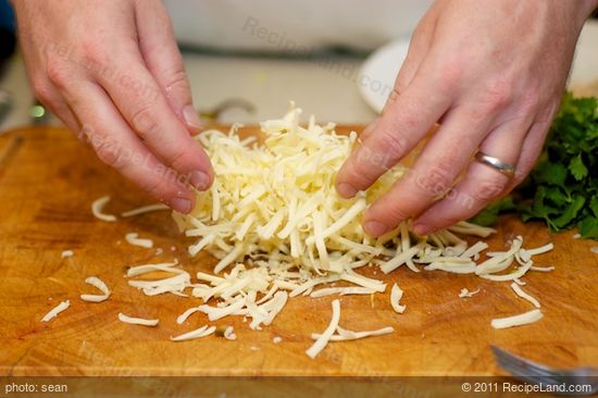 Mixing the pickled jalapenos into my mock pepper jack cheese