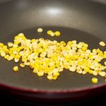 Cook corn in the preheat pan until brown...