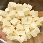 Place all the tofu cubes in a large bowl...
