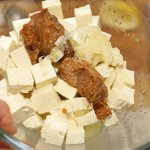 Toss tofu with the marinade...