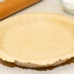 Invert the dough into the prepared 9-inch pie pan.