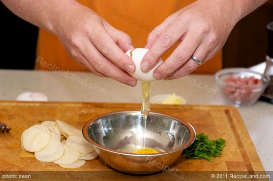 Crack the eggs into a bowl