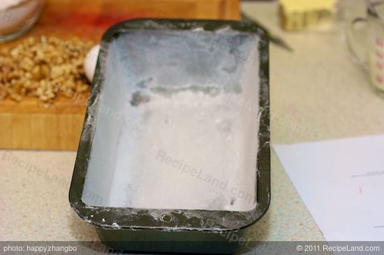 This is a well buttered and floured loaf pan.