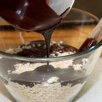 Remove from stove and pour into oats and coconut...