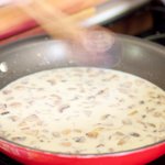 Scraping the pan bottom to get all the browned bits off the bottom...