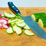 Have and thinly slice the cucumbers...