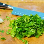 Coarsely chop the cilantro and celery leaves...