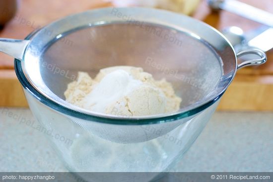 Add the flour, baking powder and salt in a fine sieve over a large bowl...
