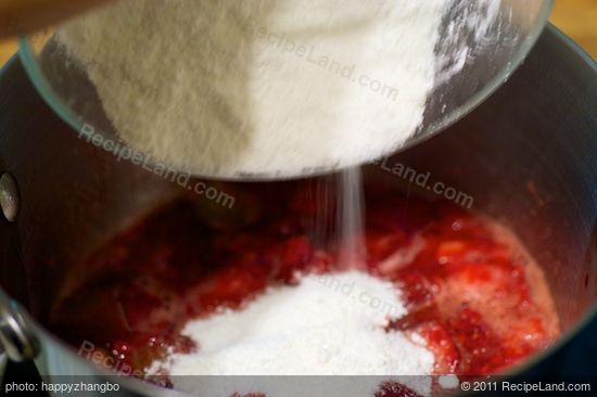 After 5 minutes, add the sugar mixture into the pot...