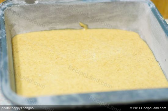 Spread half of the batter evenly into he prepared baking dish...
