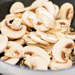 Bisquick Quiche - rsw sliced mushrooms in skillet