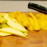 Slice the mangos into about 1/2-inch thick slices...