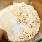Add the flours, oats, baking soda, and salt in a large bowl...