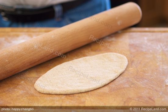 Let rest 5 minutes. Roll out each ball to a ¼-inch thick round...