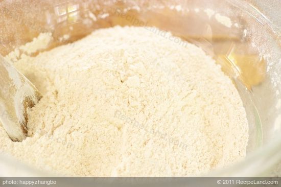 Stir well the sifted flour mixture until well mixed, and set aside...