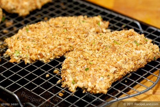 The breaded chops are ready for the oven