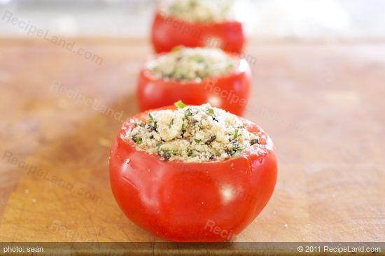 Stuff each of the prepared tomato shells, pack it in!