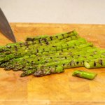Sliced asparagus are ready to toss.