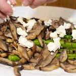 Place the aspragus, mushrooms and goat cheese onto a large platter.