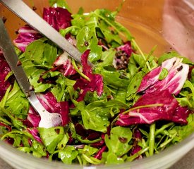 Arugula Salad Warm Goat Cheese with Black Olive Vinaigrette