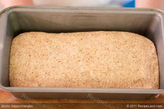 Here the dough is perfectly placed in the prepared loaf pan.