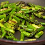 Cook until the aspragus is browned and almost tender, 4 to 5 minutes, stirring once.