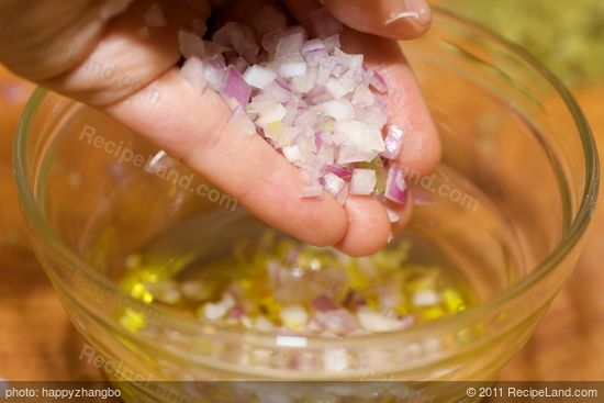 Add the minced shallots or red onions.