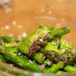 Toss until well coated, then place over the mixed greens.