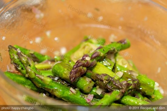 Toss until well coated, then place over the mixed greens.