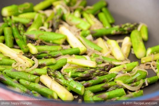 Cook until softened and asparagus is tender-crisp, about 1 minute, stirring often.