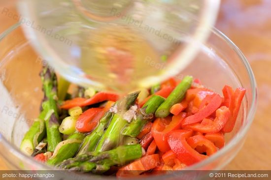 Pour the remaining dressing over the asparagus and roasted bell pepper.