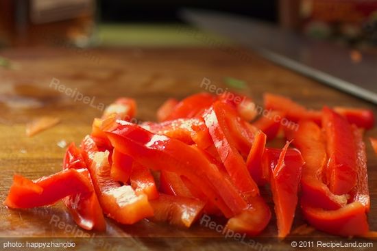 Slice the red bell pepper.
