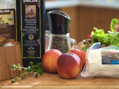 Grilled Peaches with Baby Greens, Goat Cheese and Balsamic Glaze