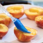 Brush peaches with the vegetable oil inside.