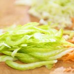 Thinly slice the celery.