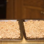 Spread mixture evenly between two baking sheets.