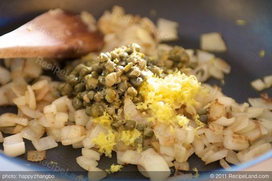 Add the lemon zest and capers to the cooked onions.