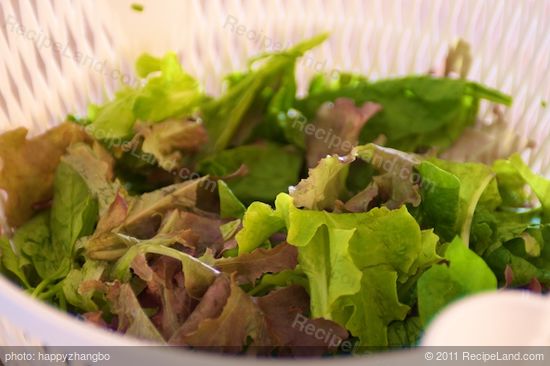 Prepare some mixed baby greens or any kind of green.