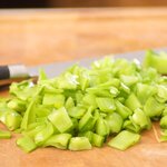 Chop the snow peas into 1/2-inch pieces.