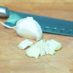 Peel and chop the garlic.