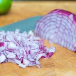 Chop the red onions.