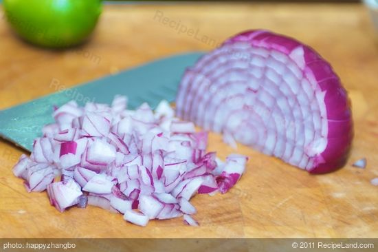 Chop the red onions.